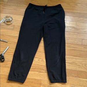 New Balance Men's Ultra Lightweight Black Joggers w/ side zip ankles